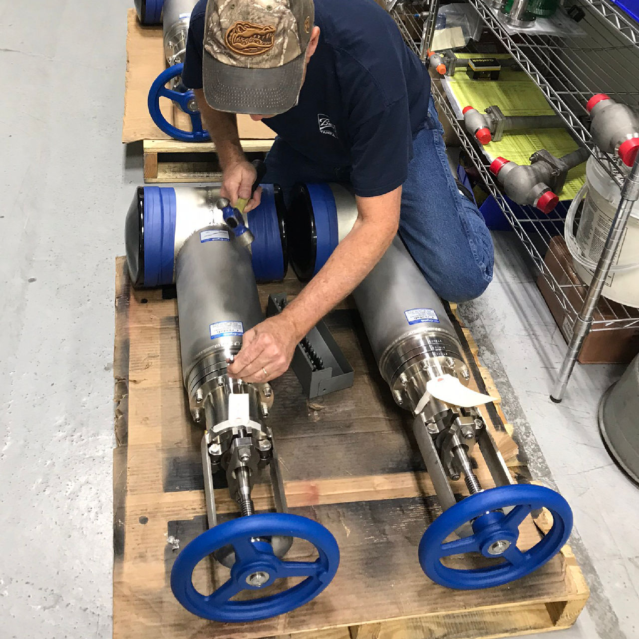 Employee assembling a large CV8 valve